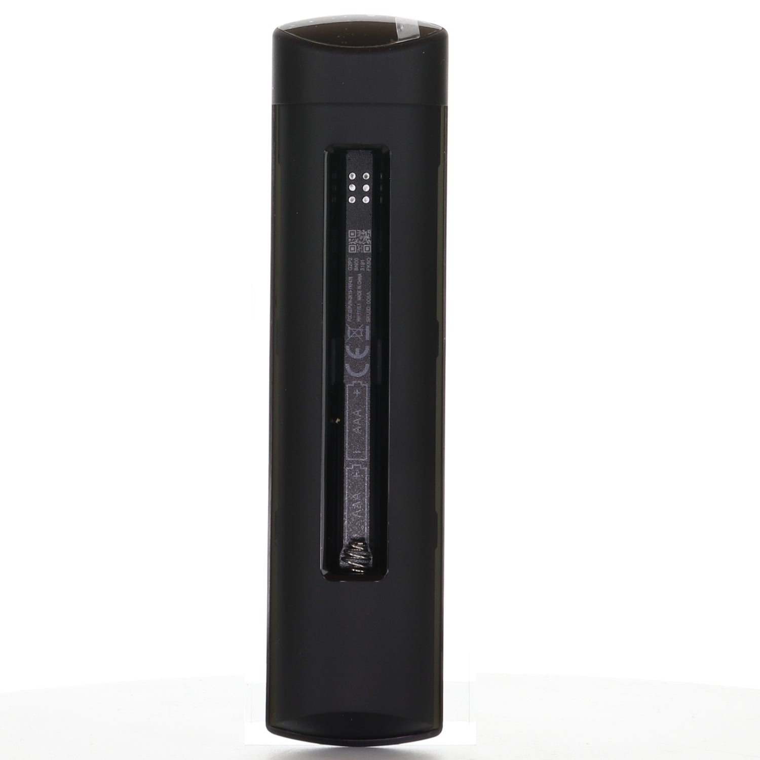 A Toshiba PUW-2K19-YKF478 FIRE TV Remote Control (for 2024/2023 TVs, Prime Video, Netflix, Directv, Peacock) is shown upright on a white surface with its battery compartment open and no batteries inside.