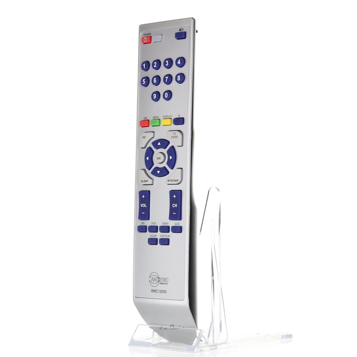 A silver Anderic 98TR7SW1NEMNF, compatible with MAGNAVOX TV Remote RMC12005, featuring blue and gray buttons, is displayed on a clear plastic stand.