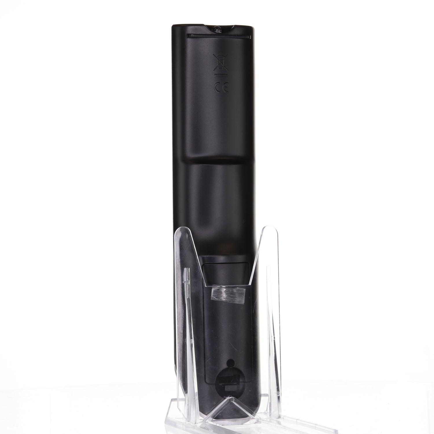 A sleek black electronic device, similar to the Anderic 076R0LJ030 for Sansui TV/DVD Remote Control - RMC12052, stands vertically on a clear plastic stand against a white background.