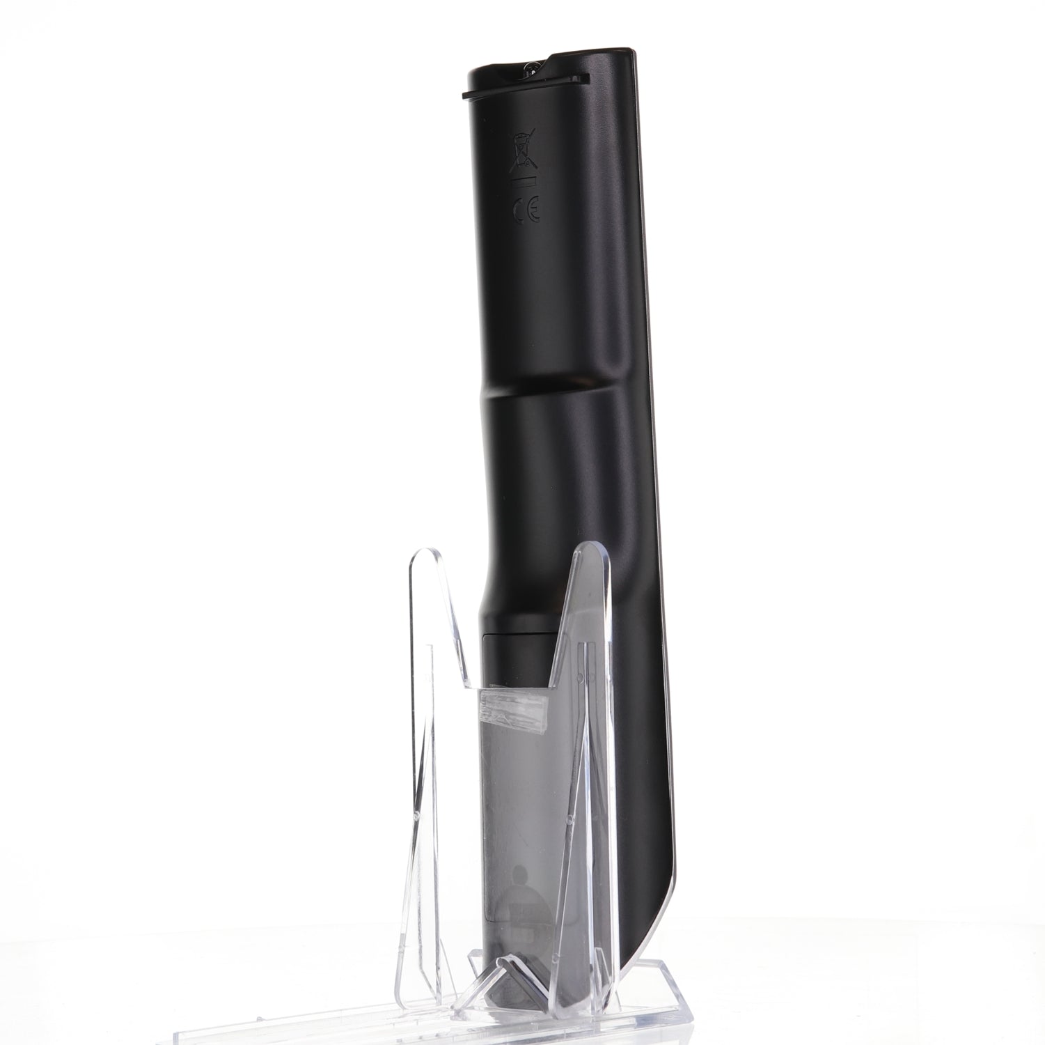A black cordless hand vacuum rests upright on a transparent stand against a white background, resembling the ideal pairing of the Anderic 076R0LJ030 remote with a Sansui TV/DVD combo.