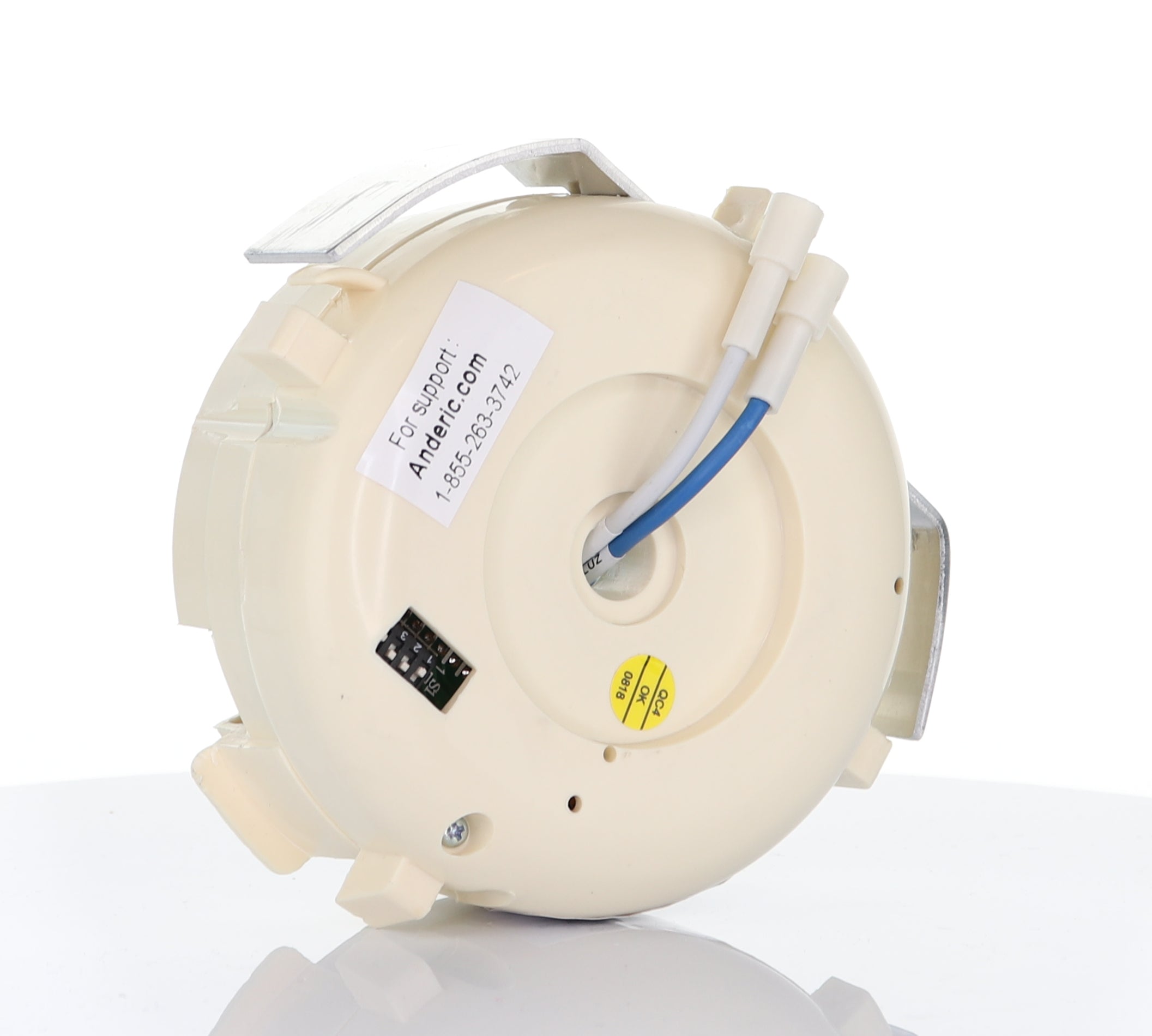 A white plastic Anderic UC7051R Replacement Ceiling Fan Receiver for 3-speed fans with reverse function, featuring attached wiring and a support label, is displayed on a reflective surface.