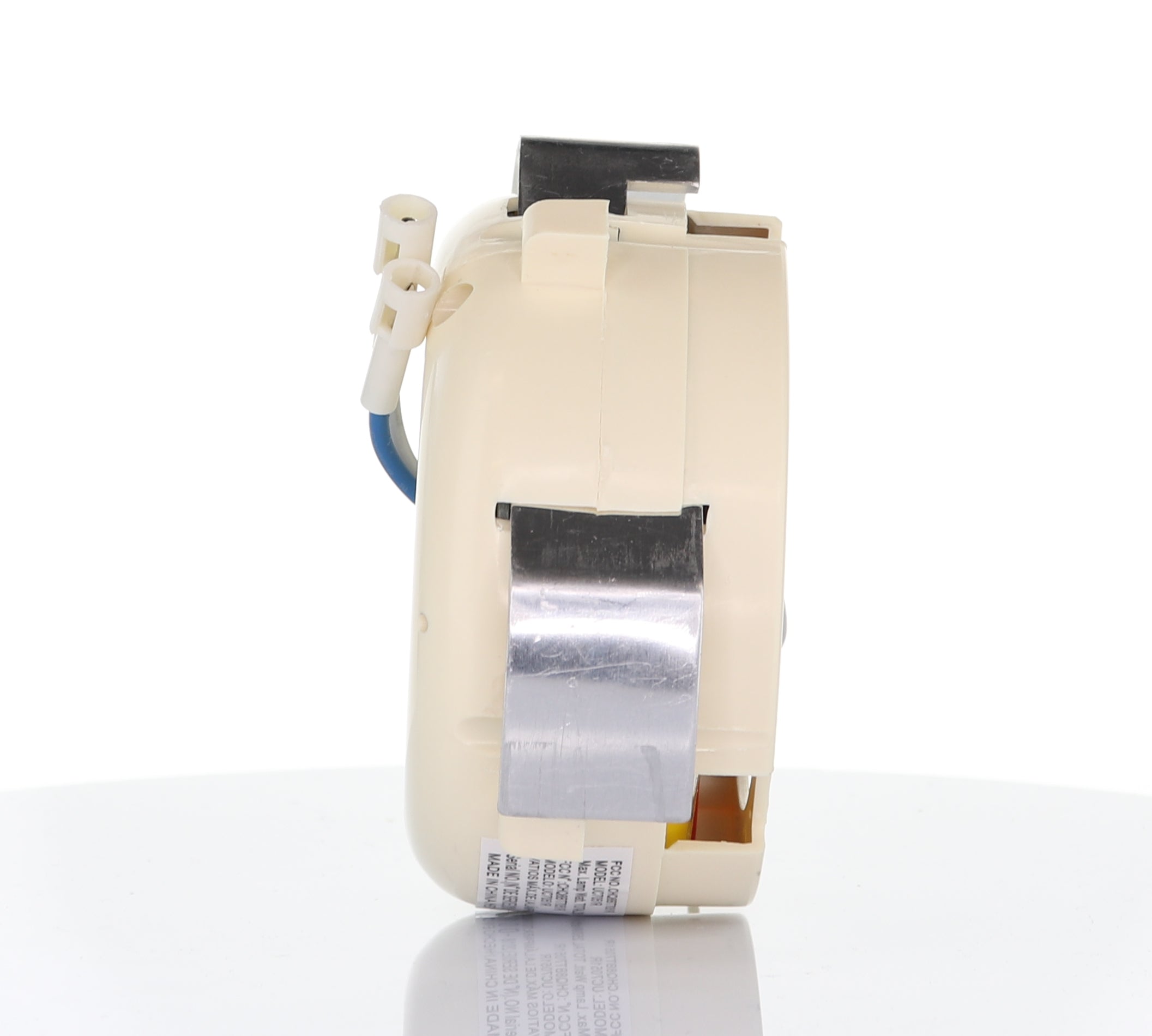 Side view of a beige plastic Anderic UC7051R Replacement Ceiling Fan Receiver for 3-Speed Fans with Reverse Function, featuring attached wires and metal tape, standing on a reflective white surface.