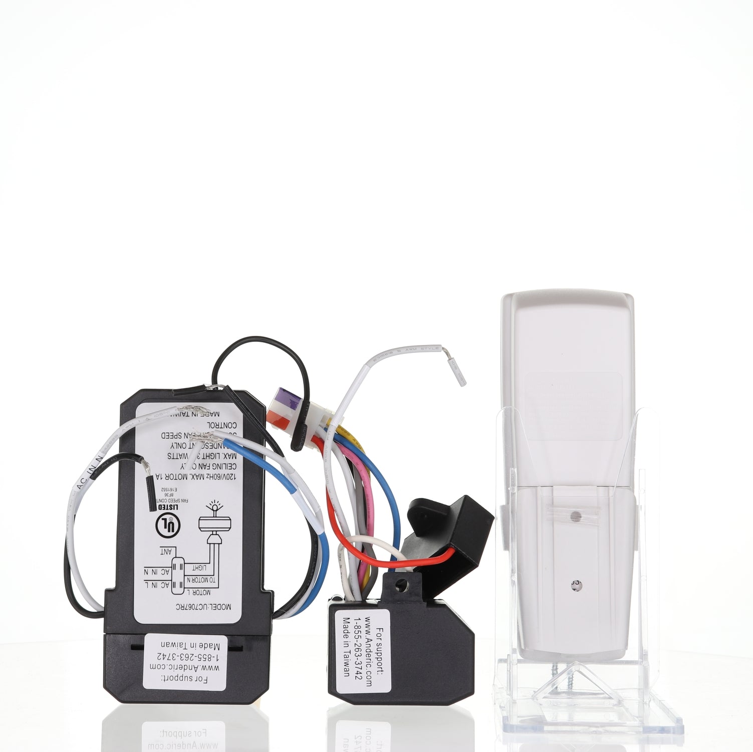 The Anderic RR7078TR UC7067FMRX UC7067REVB Reverse module Ceiling Fan Remote Control Kit, featuring a control module, wiring harness, and handheld remote, is elegantly displayed on a white background.
