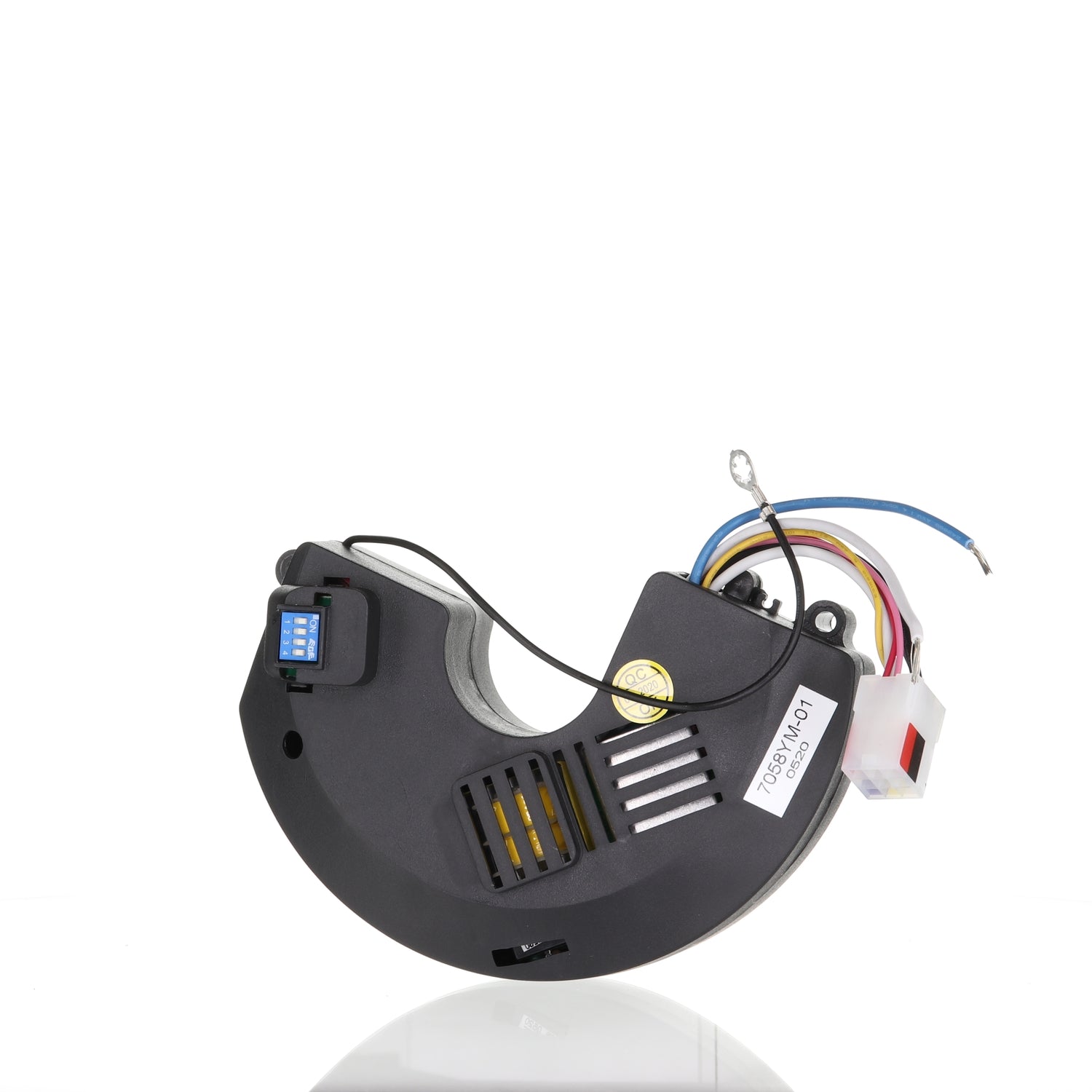 Black plastic Anderic UC7058RY/7058YM-01 receiver for Windward II and Brookedale ceiling fans with multicolored wires, a connector, blue switch, and metal loop—shown on a white reflective surface.