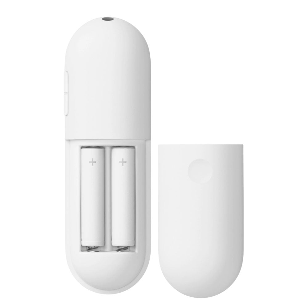 The Google Chromecast 4K Snow Streaming Remote Control features a white battery compartment holding two AA batteries alongside a separate plastic cover.