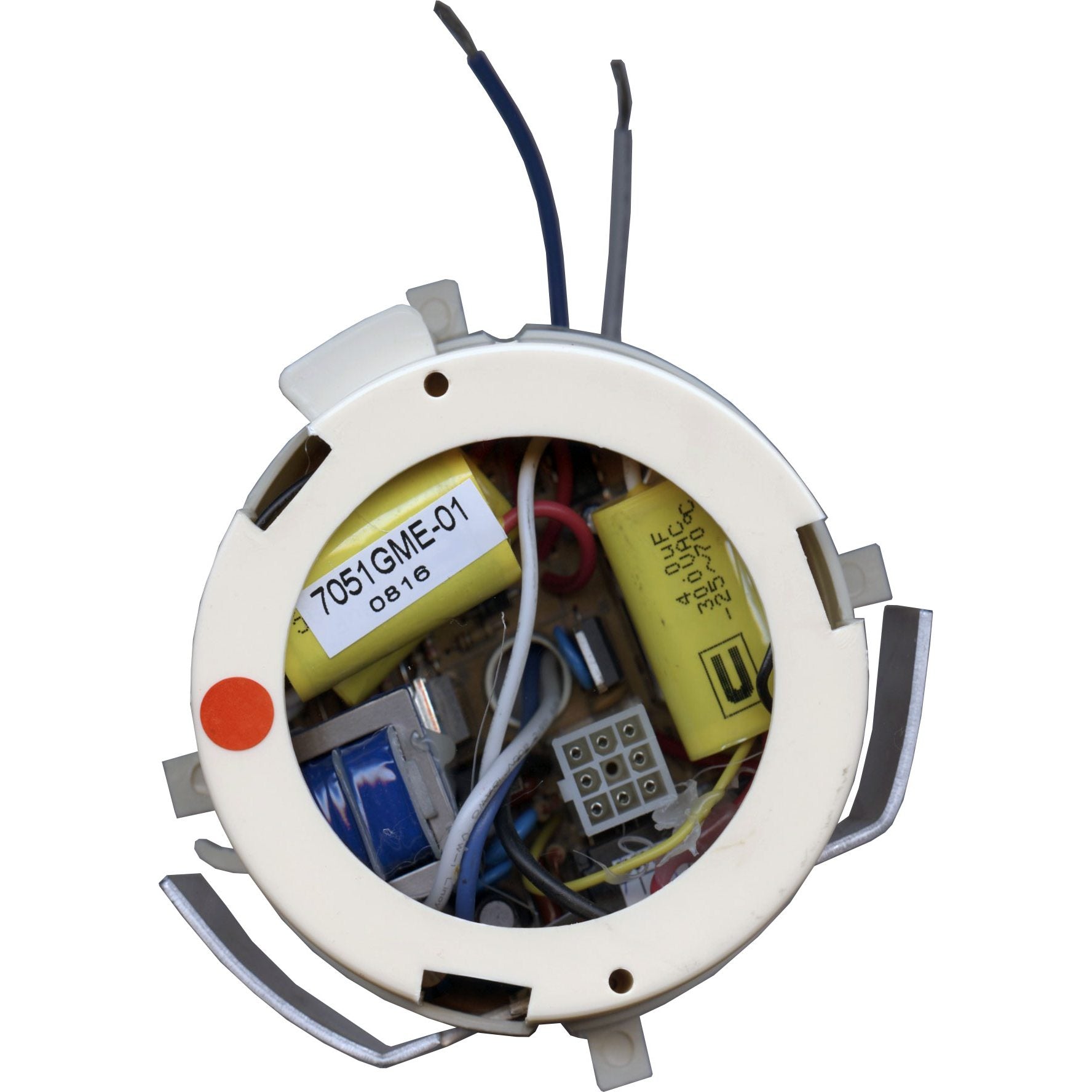 Close-up of the Anderic UC7051G ceiling fan receiver for Hampton Bay, showing wires and capacitors inside a round, white casing.