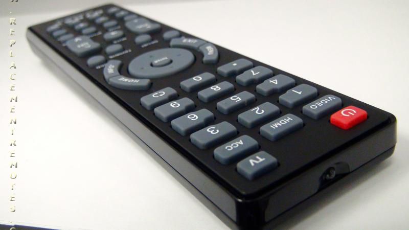 Close-up of a Dynex DXRC03A13 TV remote control on a white surface, featuring numeric and function buttons with a prominent red power button.