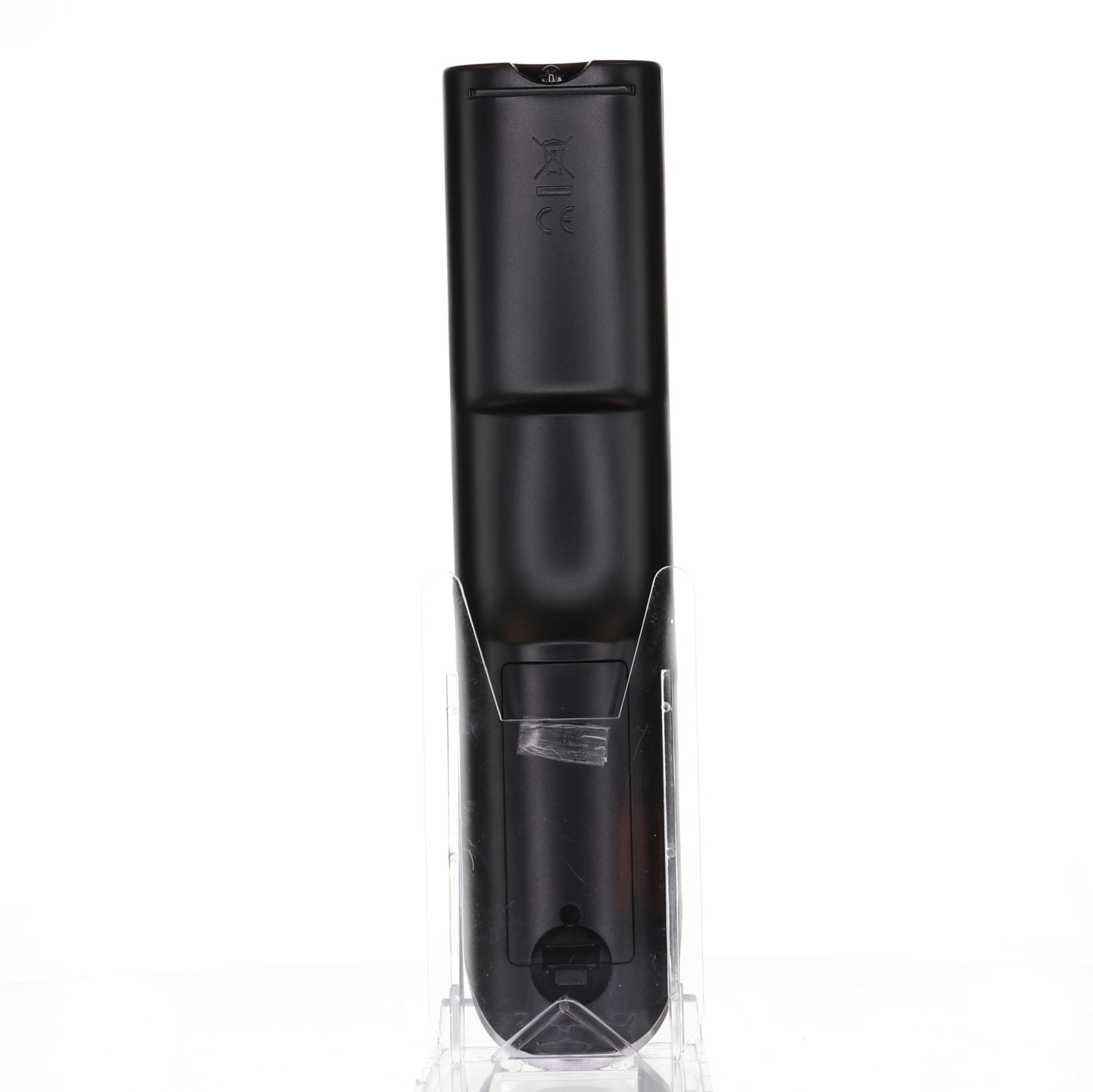 A sleek Anderic 076R0LJ030 remote control for Sansui TV/DVD combos stands upright in a transparent holder against a white background, perfectly designed.