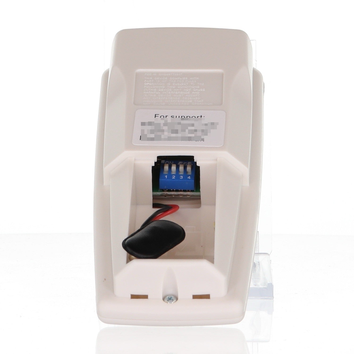 Anderic RR7099T ceiling fan remote control back view showing the battery compartment and four blue DIP switches.