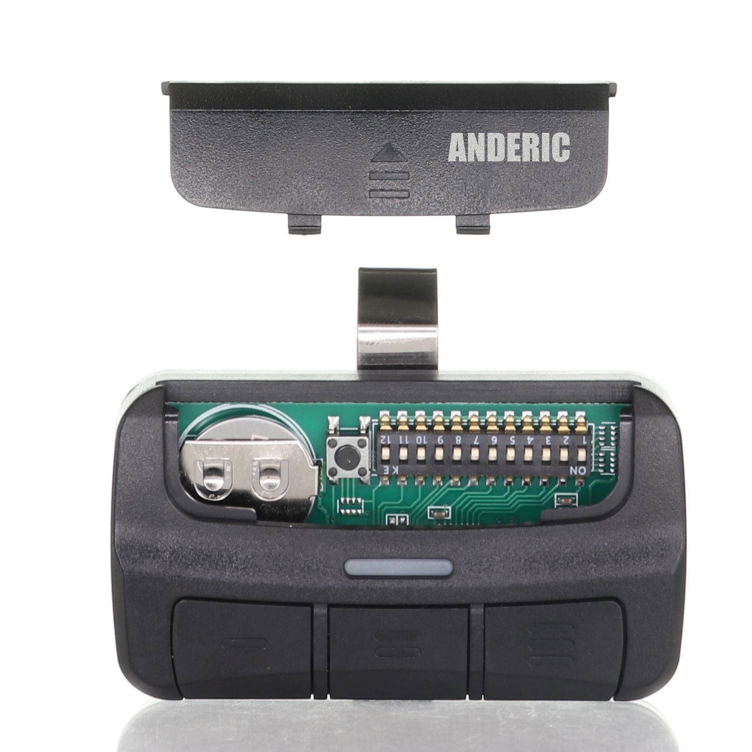 Anderic 3-button garage door remote with back cover removed showing internal circuit board and DIP switches