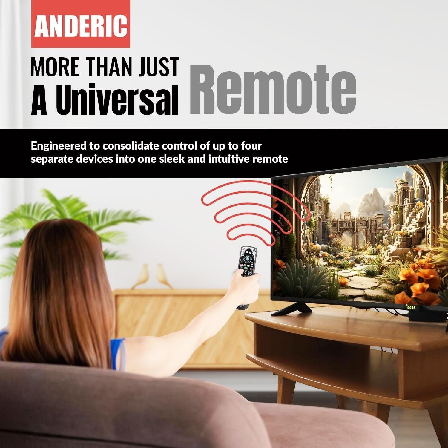 Anderic universal TV remote control being used by a woman to operate a flat-screen television in a living room.