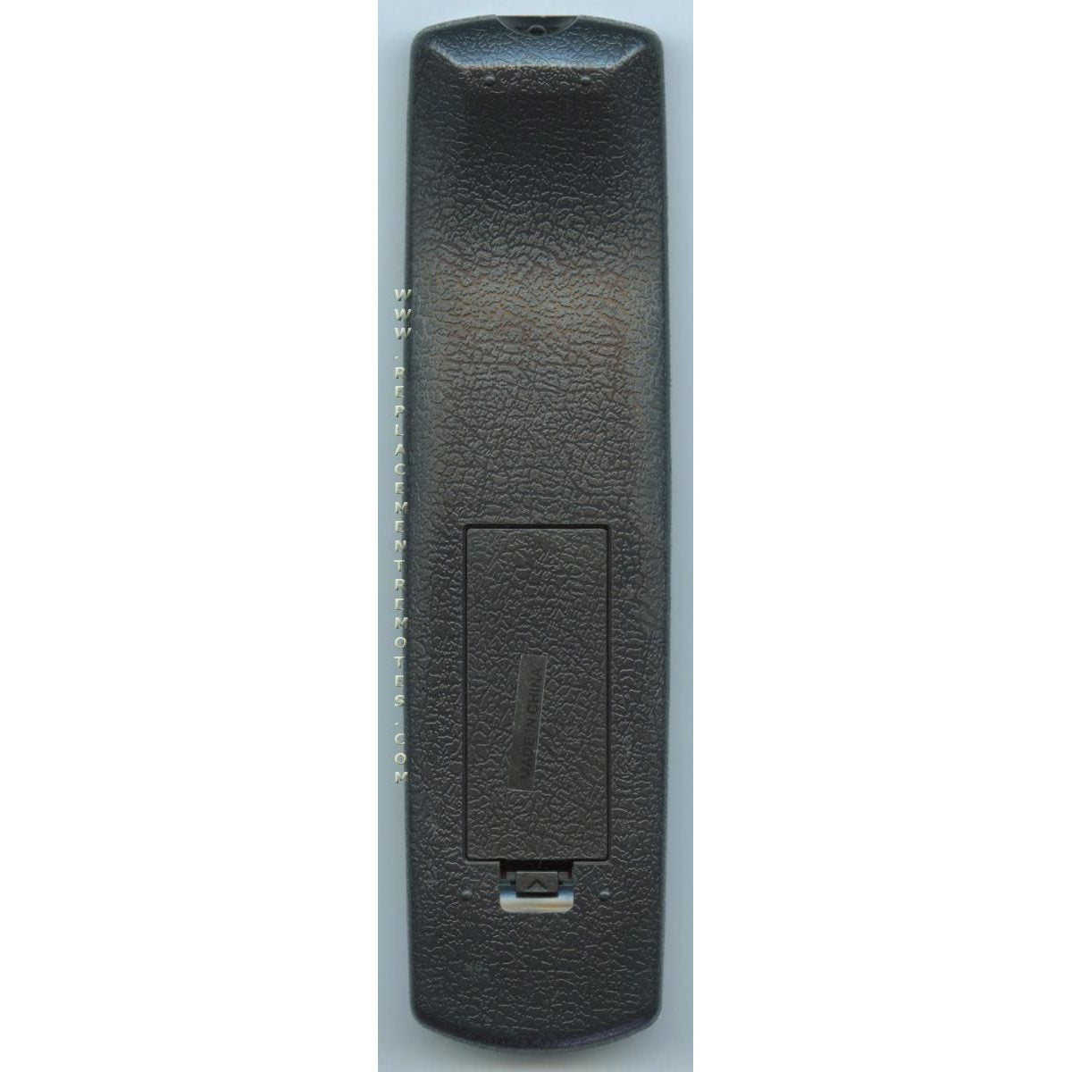 The rear view of the Anderic RR0A60 Mitsubishi TV Remote Control, black in color, reveals the battery compartment cover resting on a textured surface.