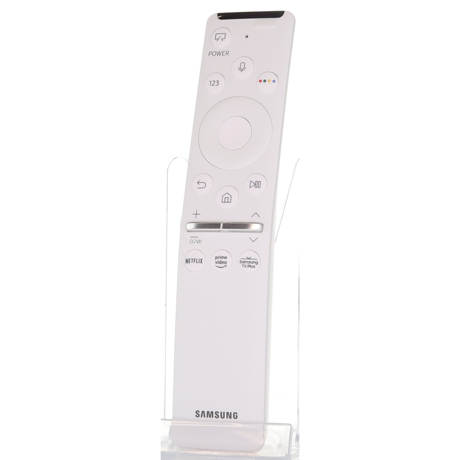 The Samsung BN59-01330H Voice TV Remote Control stands upright in a clear holder, offering easy access to Netflix, Prime Video, and Samsung TV Plus with dedicated buttons for The Frame TV and convenient voice control.